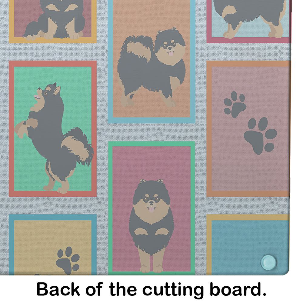 Lots of Black and Tan Pomeranian Glass Cutting Board