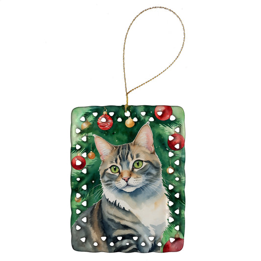 Buy this American Bobtail Cat By the Christmas Tree Porcelain Ornament